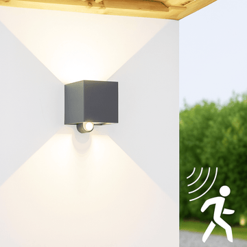 Lumo Qube Sensor-Wandleuchte für den Außenbereich mit Lichtquelle – 380 lm, 1800 K – Schwarz - LED.de